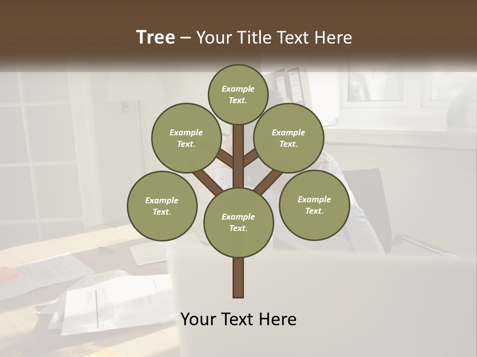 A Woman Sitting At A Desk In Front Of A Laptop Computer PowerPoint Template