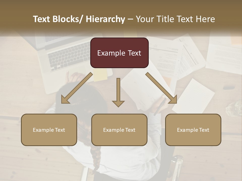 A Woman Sitting At A Table With A Laptop And Papers PowerPoint Template