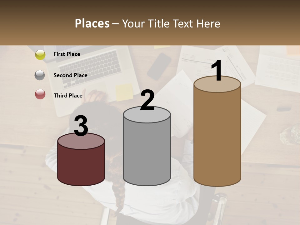 A Woman Sitting At A Desk With A Laptop And Papers PowerPoint Template