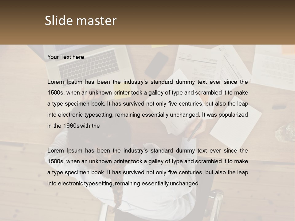 A Woman Sitting At A Desk With A Laptop And Papers PowerPoint Template