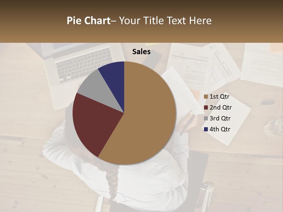 A Woman Sitting At A Desk With A Laptop And Papers PowerPoint Template