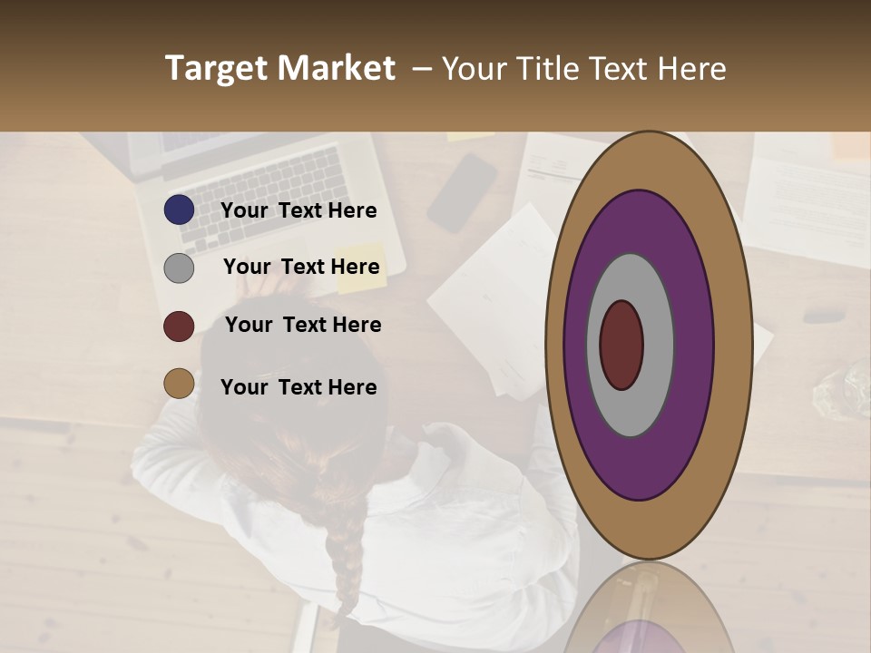 A Woman Sitting At A Desk With A Laptop And Papers PowerPoint Template