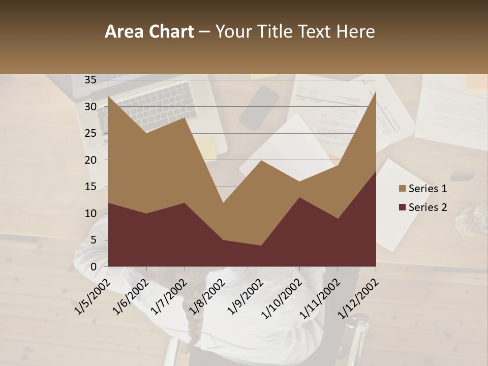 A Woman Sitting At A Desk With A Laptop And Papers PowerPoint Template