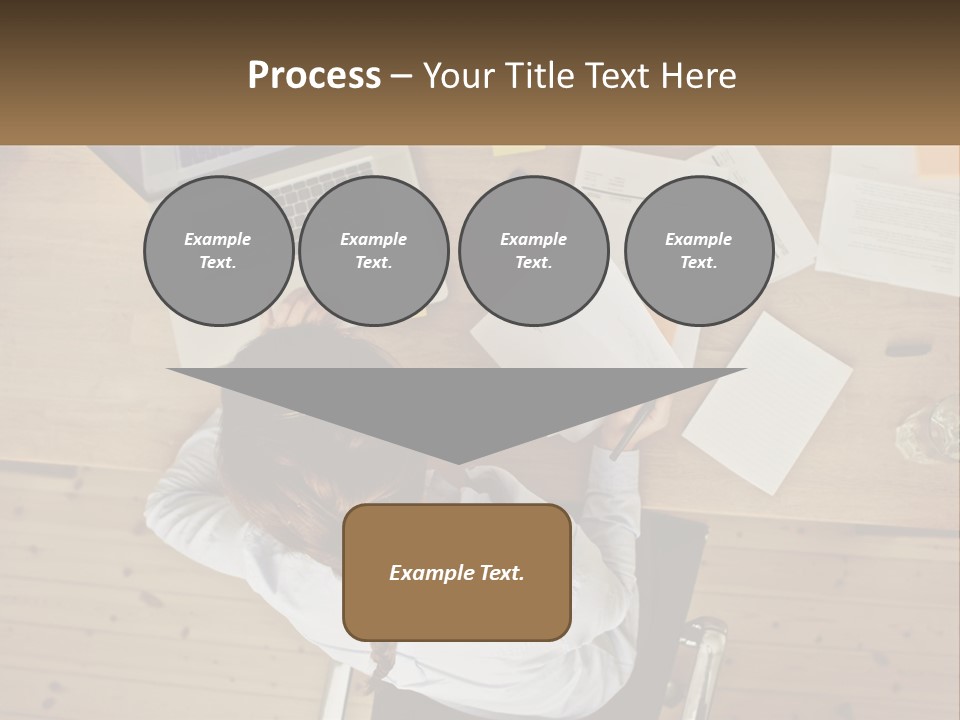 A Woman Sitting At A Desk With A Laptop And Papers PowerPoint Template