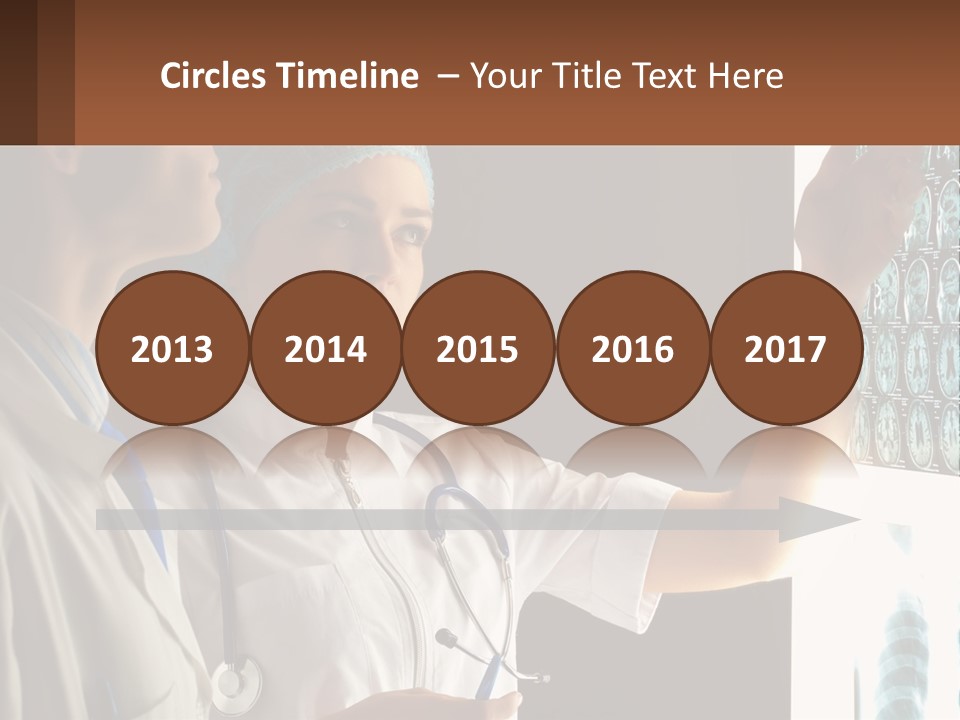 A Doctor And A Nurse Looking At A X - Ray PowerPoint Template