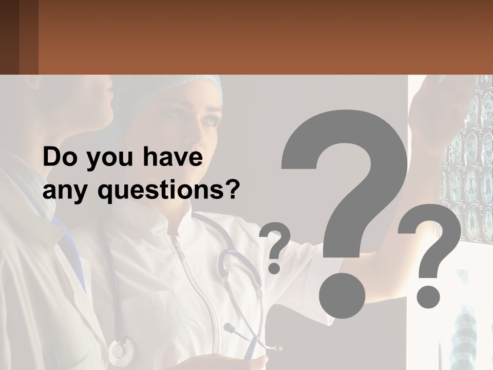 A Doctor And A Nurse Looking At A X - Ray PowerPoint Template