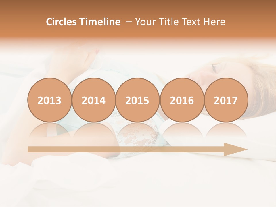 A Beautiful Blonde Woman Laying In Bed With Her Eyes Closed PowerPoint Template