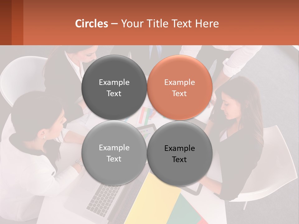 A Group Of Business People Sitting Around A Table PowerPoint Template