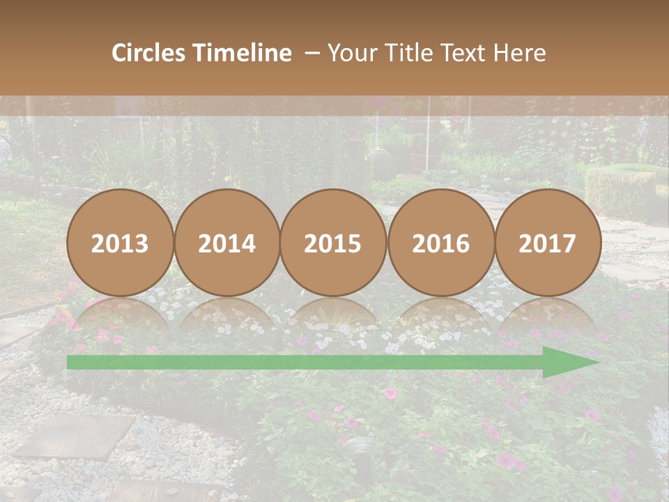 A Picture Of A Garden With Flowers And Rocks PowerPoint Template