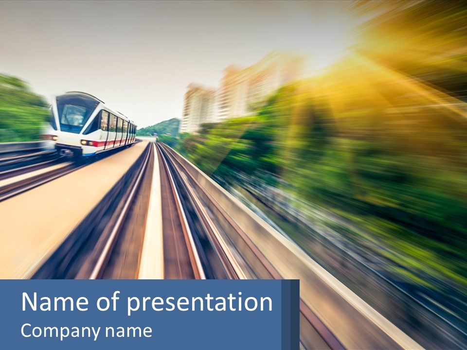 A Train Traveling Down A Train Track With Trees In The Background PowerPoint Template