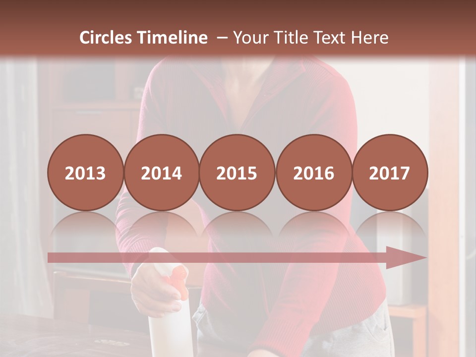 A Woman Is Cleaning A Table With A Rag PowerPoint Template