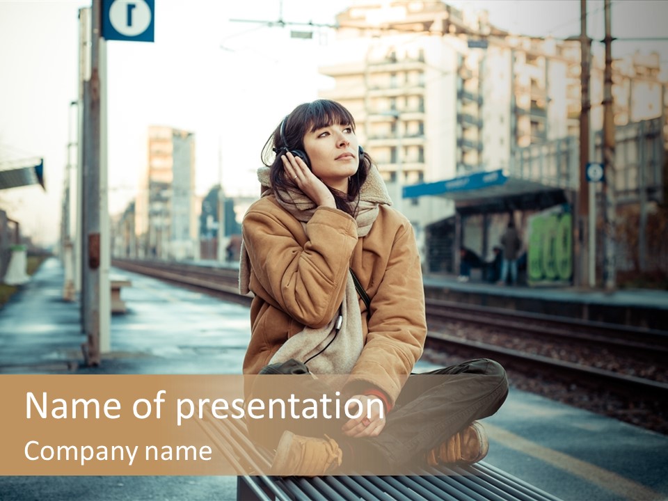 A Woman Sitting On A Bench Talking On A Cell Phone PowerPoint Template