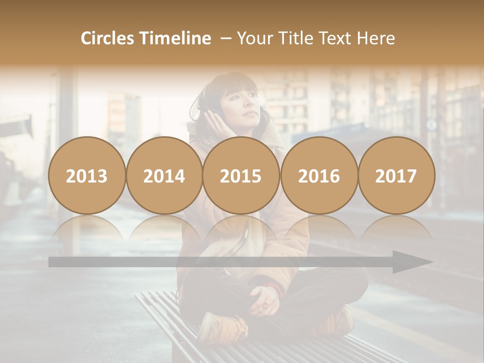 A Woman Sitting On A Bench Talking On A Cell Phone PowerPoint Template