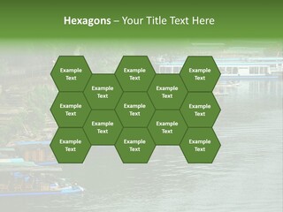 A Group Of Boats Floating On Top Of A River PowerPoint Template