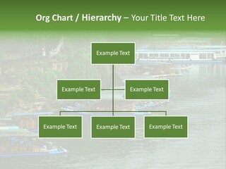 A Group Of Boats Floating On Top Of A River PowerPoint Template