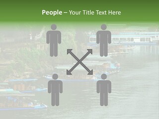 A Group Of Boats Floating On Top Of A River PowerPoint Template
