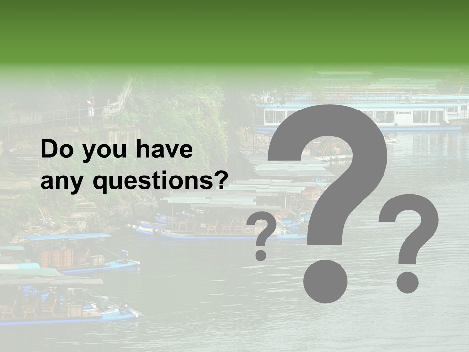 A Group Of Boats Floating On Top Of A River PowerPoint Template