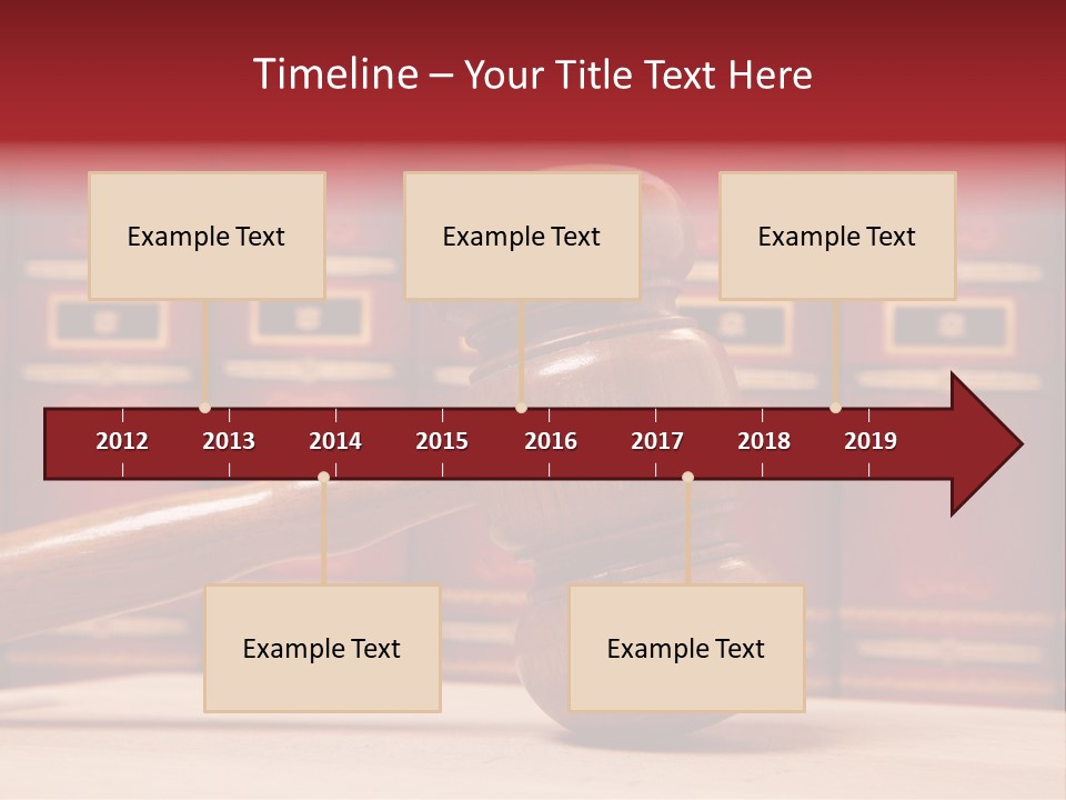 A Wooden Judge's Gavel In Front Of A Row Of Red Books PowerPoint Template