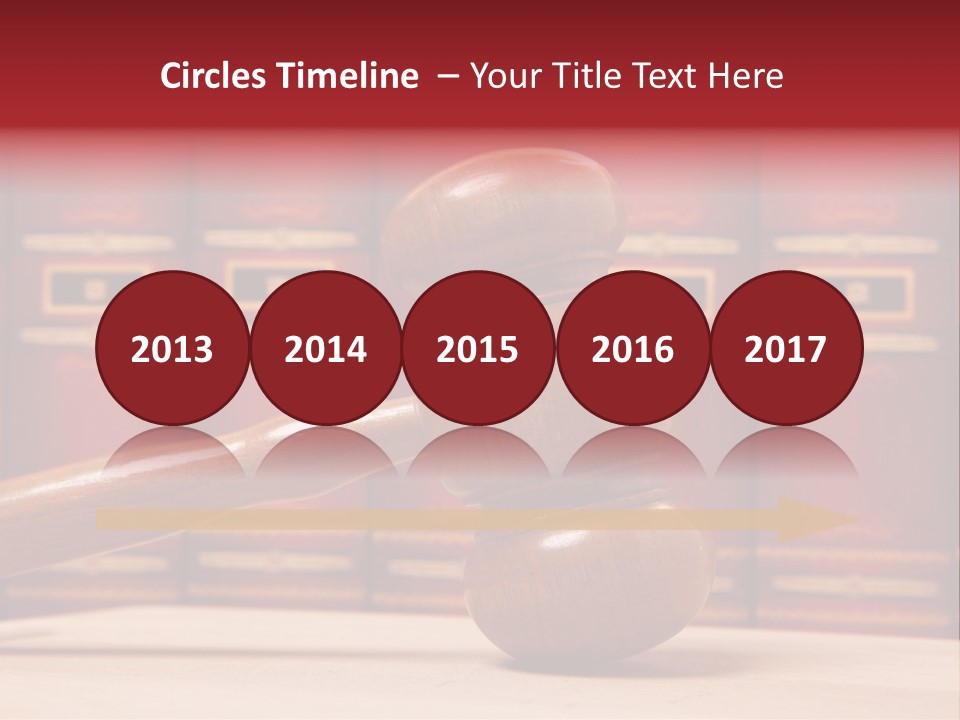 A Wooden Judge's Gavel In Front Of A Row Of Red Books PowerPoint Template