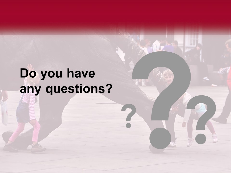 A Group Of Children Playing In Front Of A Statue PowerPoint Template