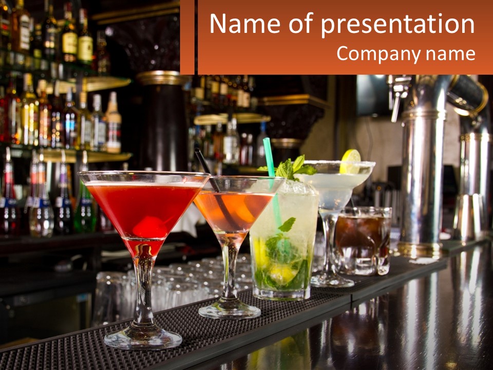 A Row Of Cocktail Glasses Sitting On Top Of A Bar PowerPoint Template