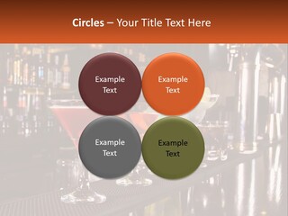 A Row Of Cocktail Glasses Sitting On Top Of A Bar PowerPoint Template