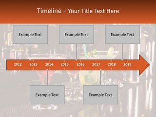 A Row Of Cocktail Glasses Sitting On Top Of A Bar PowerPoint Template