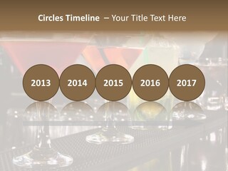 A Row Of Different Colored Drinks On A Bar PowerPoint Template