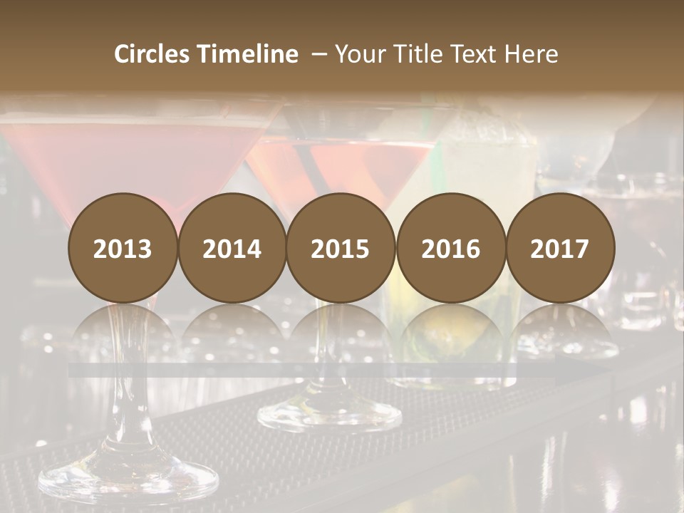 A Row Of Different Colored Drinks On A Bar PowerPoint Template