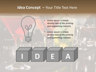 A Row Of Different Colored Drinks On A Bar PowerPoint Template