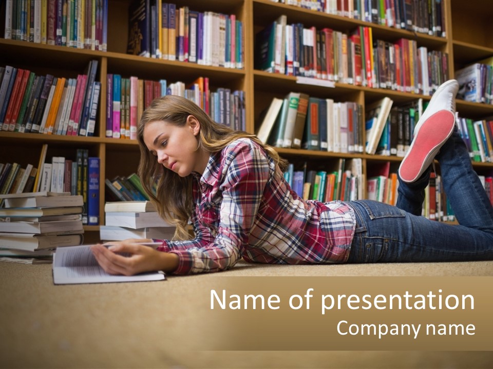 A Woman Laying On The Floor Reading A Book PowerPoint Template