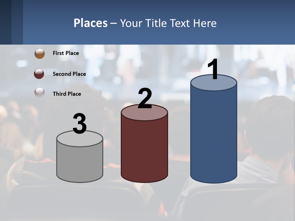 A Group Of People Sitting In Front Of A Stage PowerPoint Template