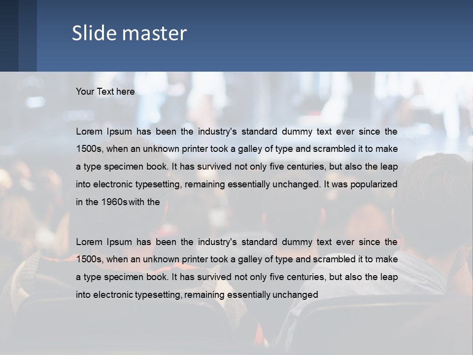 A Group Of People Sitting In Front Of A Stage PowerPoint Template