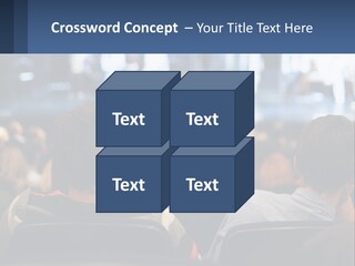 A Group Of People Sitting In Front Of A Stage PowerPoint Template