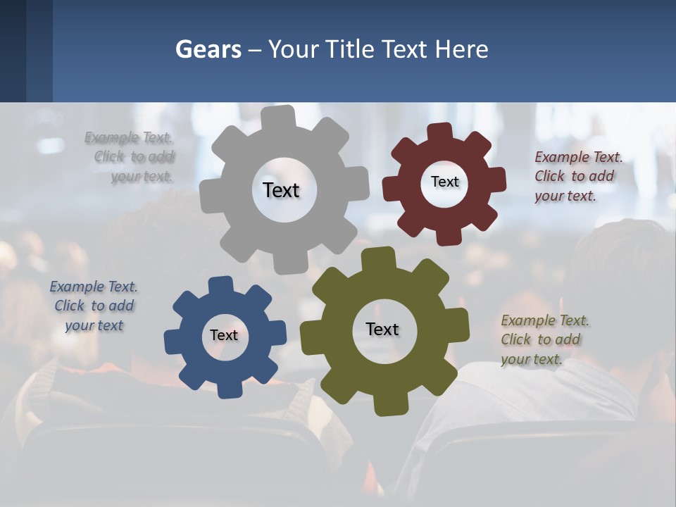 A Group Of People Sitting In Front Of A Stage PowerPoint Template