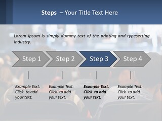 A Group Of People Sitting In Front Of A Stage PowerPoint Template