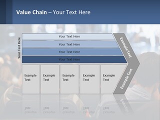 A Group Of People Sitting In Front Of A Stage PowerPoint Template