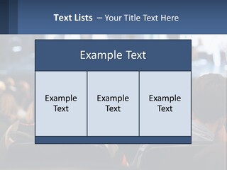 A Group Of People Sitting In Front Of A Stage PowerPoint Template