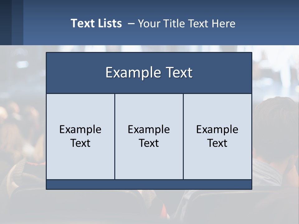 A Group Of People Sitting In Front Of A Stage PowerPoint Template