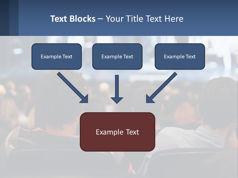 A Group Of People Sitting In Front Of A Stage PowerPoint Template