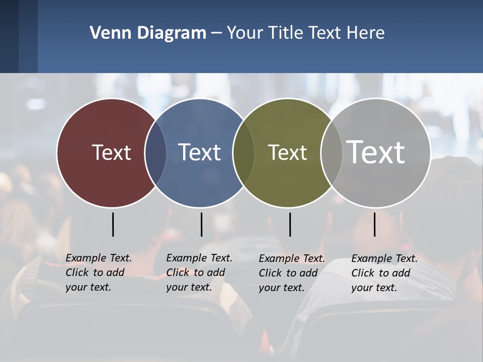 A Group Of People Sitting In Front Of A Stage PowerPoint Template
