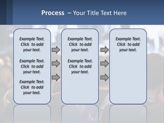 A Group Of People Sitting In Front Of A Stage PowerPoint Template
