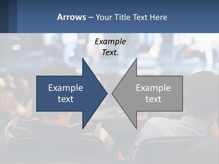 A Group Of People Sitting In Front Of A Stage PowerPoint Template