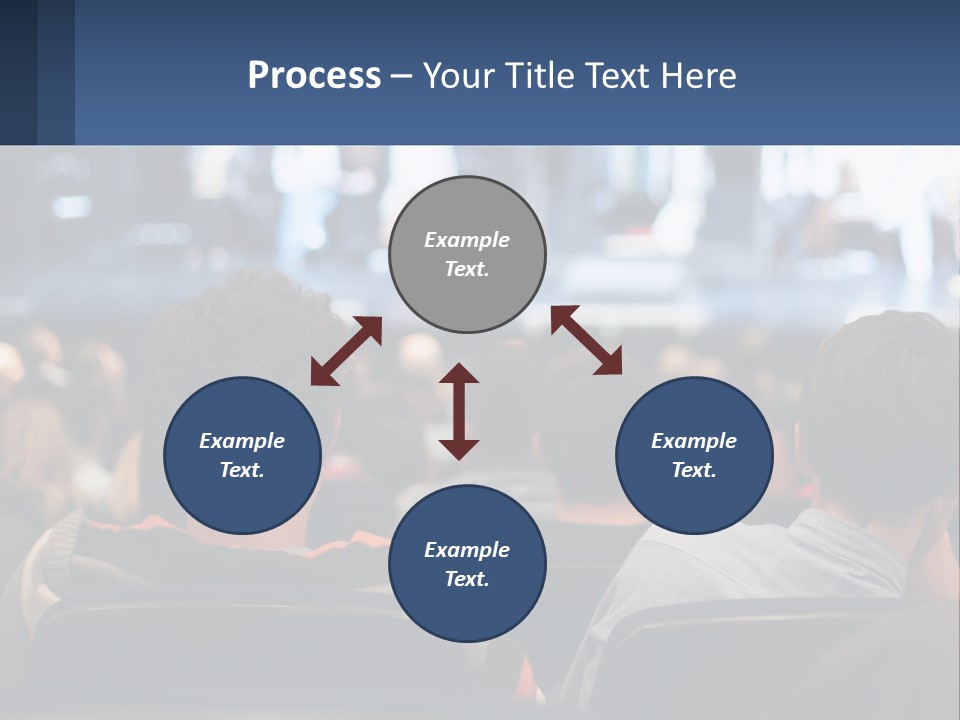 A Group Of People Sitting In Front Of A Stage PowerPoint Template