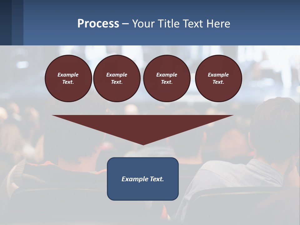 A Group Of People Sitting In Front Of A Stage PowerPoint Template