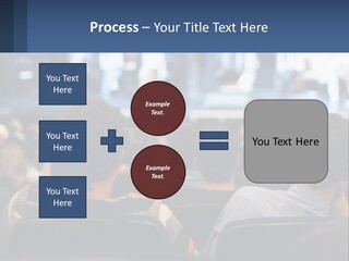 A Group Of People Sitting In Front Of A Stage PowerPoint Template