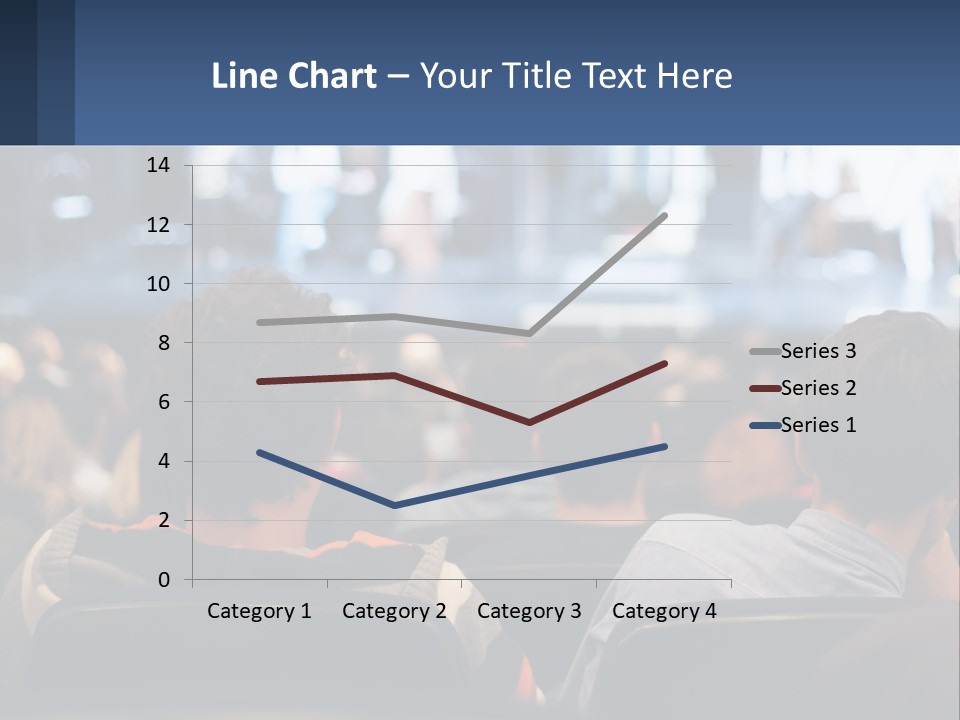 A Group Of People Sitting In Front Of A Stage PowerPoint Template