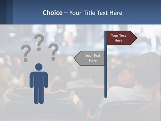 A Group Of People Sitting In Front Of A Stage PowerPoint Template