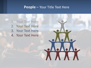 A Group Of People Sitting In Front Of A Stage PowerPoint Template