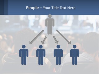 A Group Of People Sitting In Front Of A Stage PowerPoint Template